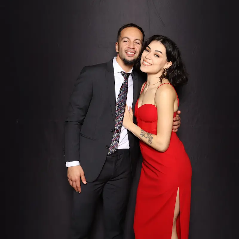 Guests enjoying the photo booth experience at an event